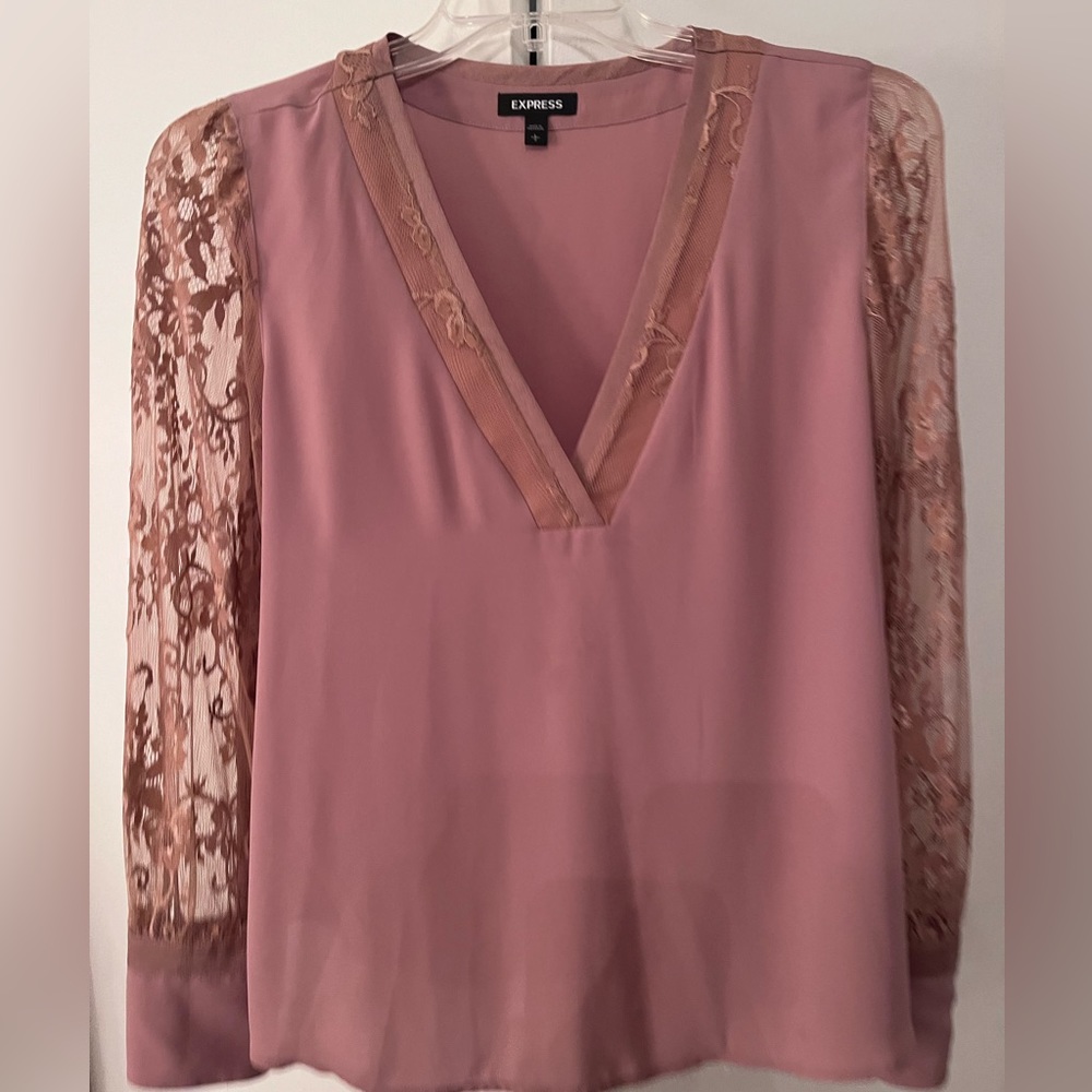 New without tags. Express lace sleeve blouse size large. Maybe color.
